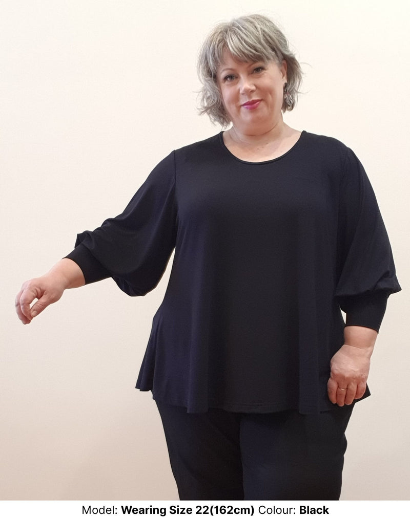 chasing springtime ethically made black plus size swing tee or top in soft high quality stretch rayon that’s cut for curves front details