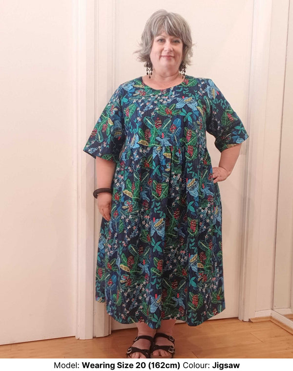 Plus size woman wearing size 20 pure cotton colourful print dress with side pockets