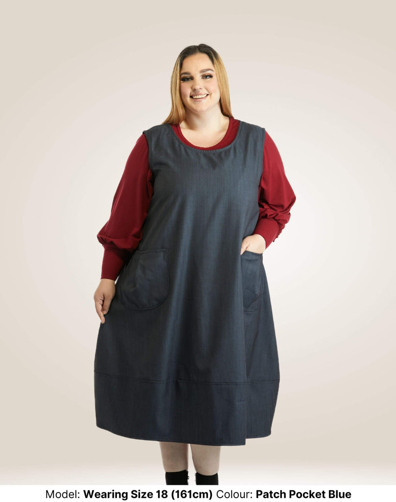 patch pocket tunic in blue with red long sleeve inncer