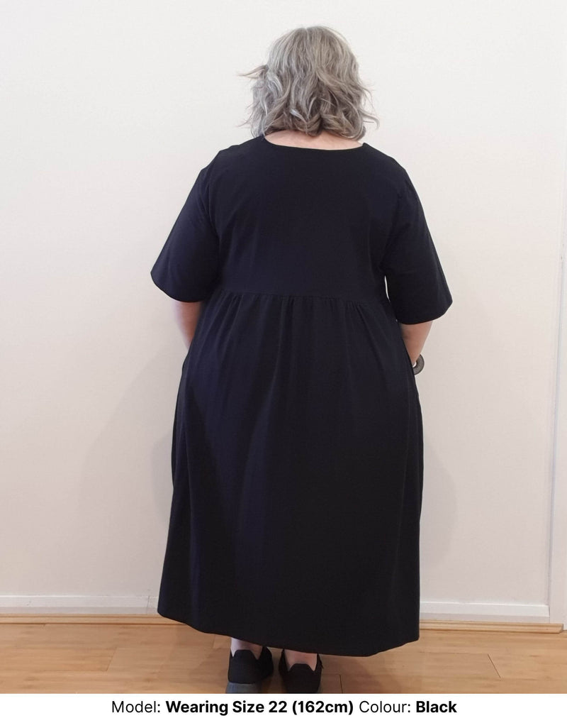 Back of the Black cotton elastane blend fabric Kitty Dress in plus size