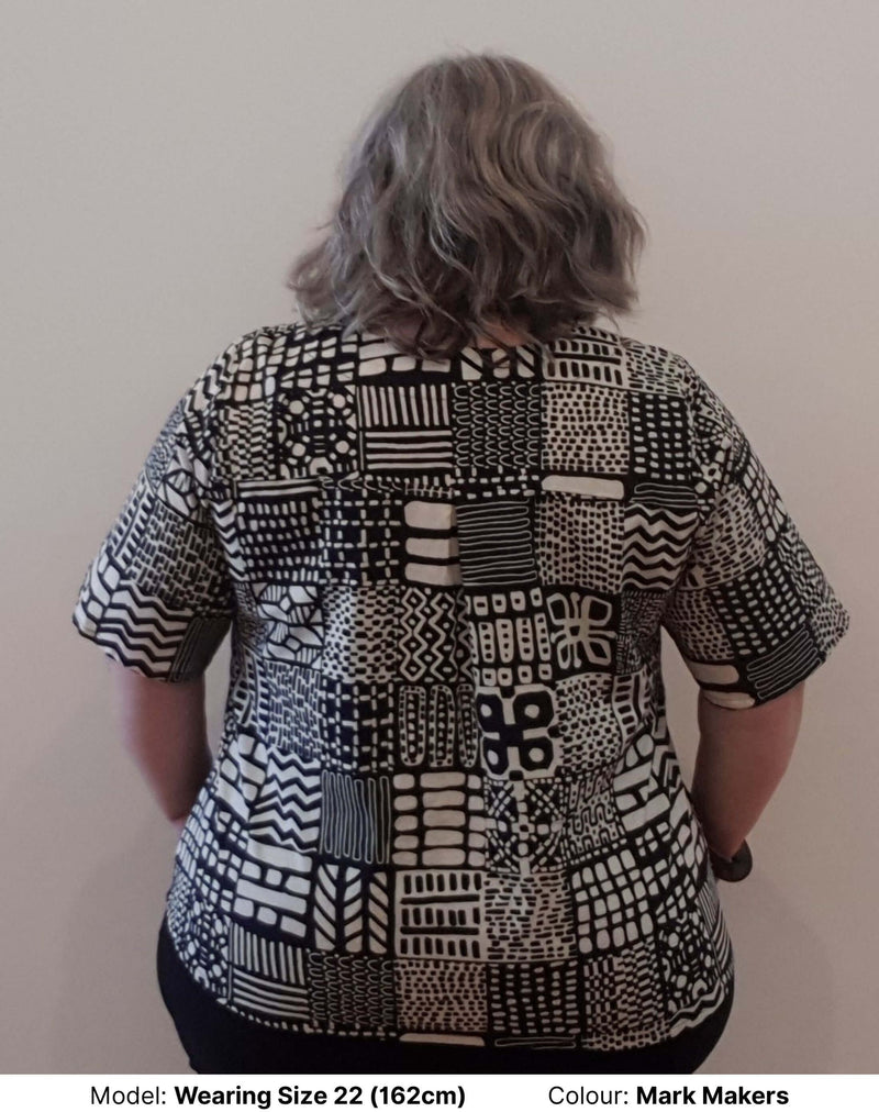 Chasing springtime back view of size 22 model wearing pure cotton blouse in contemporary print by miss moresby